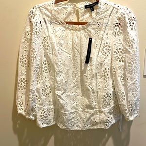 New with tags never worn banana republic medium white eyelet top. Has a side tie